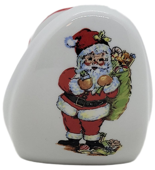 Real Vintage Christmas Santa Claus Porcelain Shoe Ashtray, decorated with a cheerful Santa holding gifts, made in Brazil.
