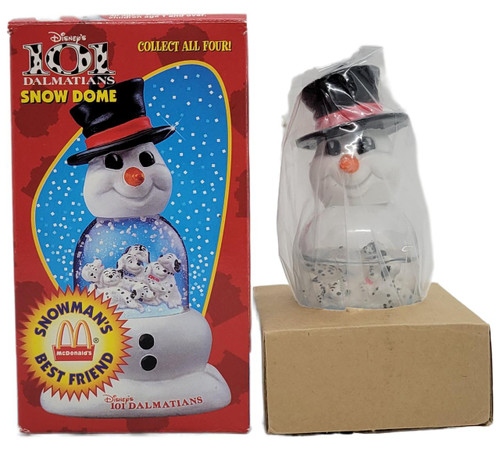 McDonald's 1996 Disney's 101 Dalmatians Snow Dome Snowman's Best Friend, snowman figurine with a black top hat, orange nose, and black eyes, packaged in plastic and displayed on a cardboard base.