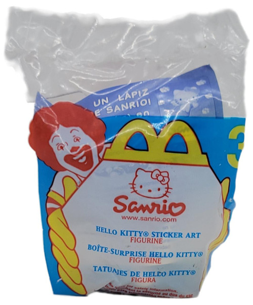 McDonald's Happy Meal Toy 2000 Hello Kitty #3 Hello Kitty Sticker Art - Cartoon Hello Kitty character on the packaging with a red bow, and a yellow and red McDonald's bag illustration, in colorful design.