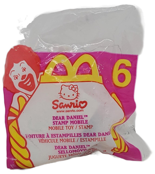 McDonald's Happy Meal Toy 2000 Hello Kitty #6 Dear Daniel Stamp Mobile, colorful packaging with Hello Kitty character and McDonald's logo.