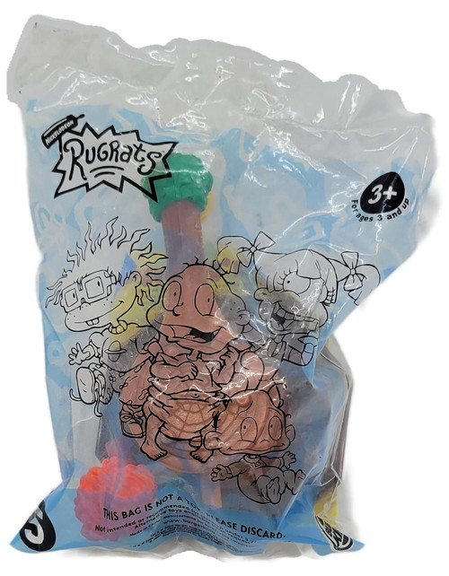 Burger King Kids' Club 2001 Rugrats Treehouse #5 Flees Bees Chuckie toy in packaging, featuring Rugrats characters with colorful toys inside.
