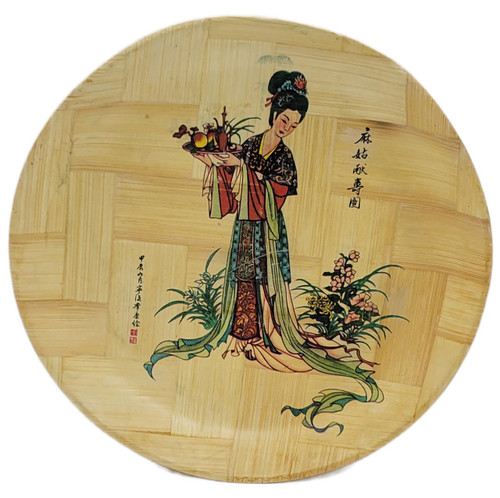 Unknown Vintage Magu Presents Longevity Woven Bamboo Hand Painted 10.75 Inch Plate, traditional Asian artwork depicting a woman in colorful attire holding a tray of fruit and flowers.