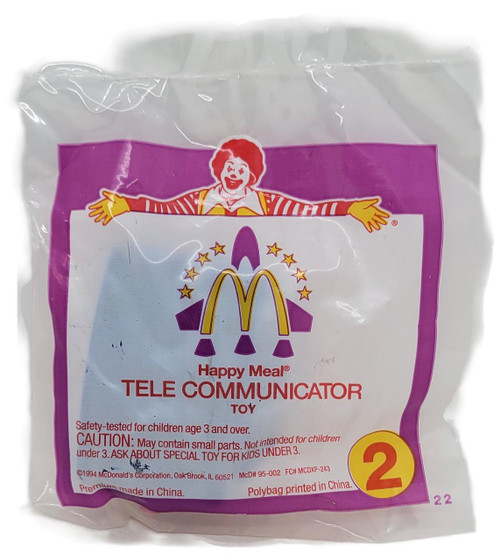 McDonald's Happy Meal Toy 1995 Space Rescue #2 Tele Communicator Toy, colorful plastic toy in packaging with Ronald McDonald image and McDonald's logo.
