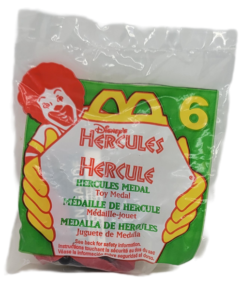McDonald's Happy Meal toy of Hercules Medal from the 1998 Disney's Hercules series of toys. The medal is gold with black backhand red string. The series contained 8 different toys and was available January 30 - February 26, 1998.