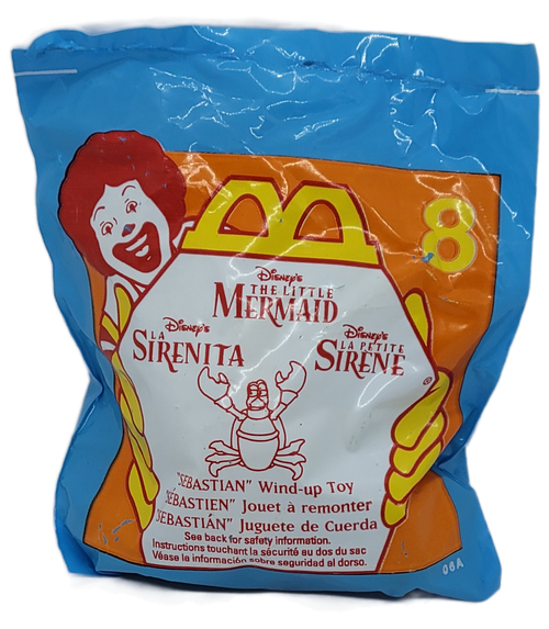 McDonald's Happy Meal toy #8 Sebastian wind-up toy from the 1997 Disney's The Little Mermaid Series. Sebastian the crab is a wind-up toy. The series contains 8 different characters and was available November 28 - December 25, 1997.