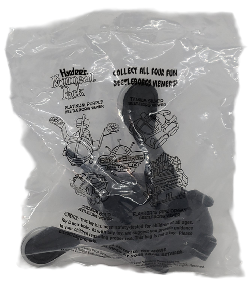 Hardee's Funmeal Pack of Platinum Purple BeetleBorgs Viewer from the 1998 BeetleBorgs Metallix series of toys. The Platinum Purple BeetleBorg Viewer is black with purple lines. The series contains 4 different BeetleBorgs Metallix vehicles.
