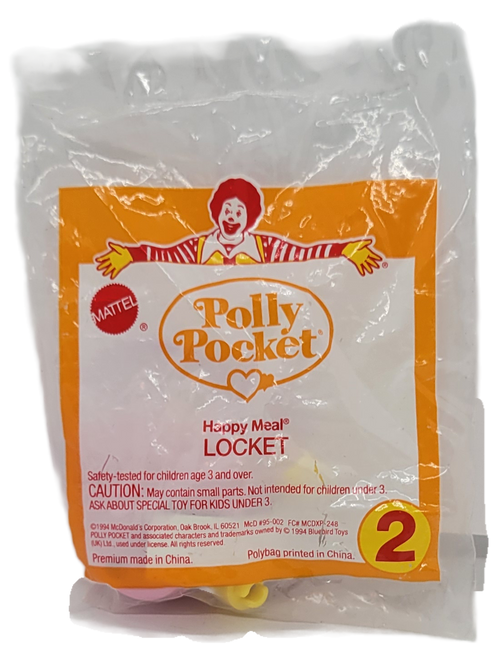McDonald's Happy Meal toy #2 Polly Pocket Locket from the 1995 Polly Pocket series. Polly Pocket is a Blue Bird Toys line. The plastic locket is a pink heart shaped locket with pink necklace.