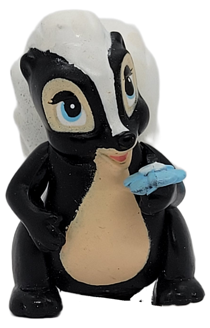 McDonald's Happy Meal toy figure of Flower the skunk from the 1988 Walt Disney's Bambi movie series of toys. The series contains 4 different characters and was available July 8 - August 4, 1988.