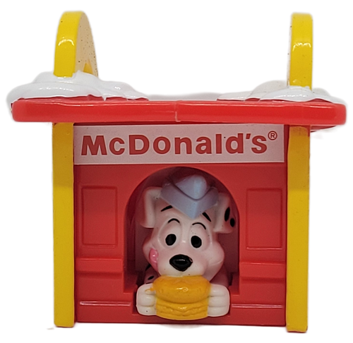 McDonald's Happy Meal toy of a Dalmatian coming out of a McDonald's doghouse. The Dalmatian was from the 2000 McDonald's 102 Dalmatians series of 102 different Dalmatian toys.