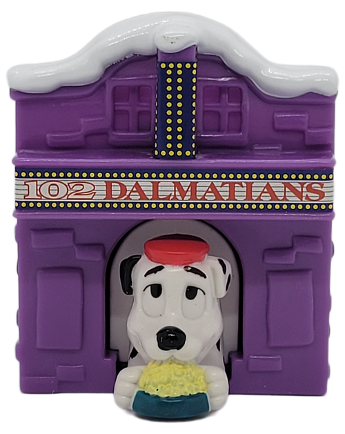 McDonald's Happy Meal toy of a Dalmatian coming out of a purple Theater doghouse. The Dalmatian was from the 2000 McDonald's 102 Dalmatians series of 102 different Dalmatian toys.