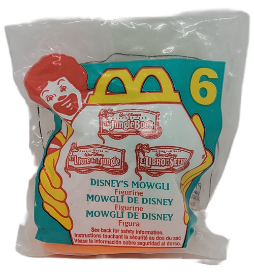 McDonald's Happy Meal toy of Disney's Mowgli from the 1997 Walt Disney's The Jungle Book series of toys. The series contains 6 different characters from the Walt Disney's The Jungle Book and was available October 3 - 23, 1997.