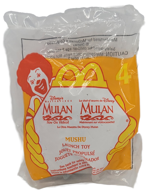 McDonald's Happy Meal toy of Mushu launch toy from the 1999 Disney's Mulan Now on Video series of toys. Mushu is sitting on top of a grey launcher. The series contains 8 toys and was available January 29 - February 25, 1999.