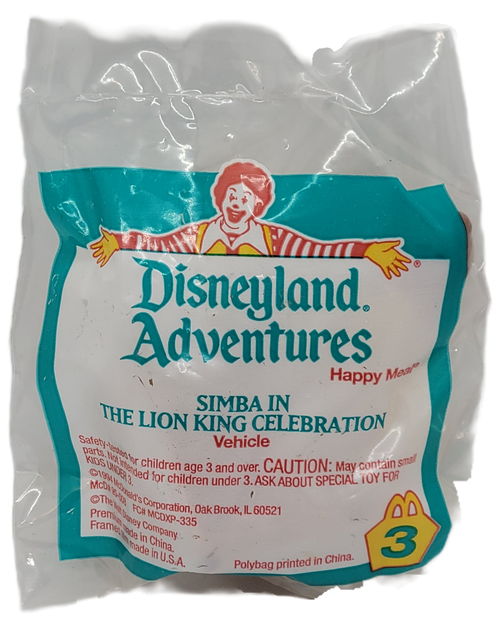 McDonald's Happy Meal toy of Simba in The Lion King Celebration vehicle from the 1995 Disneyland Adventures series of toys. Simba is standing on Pride Rock that has wheels on the bottom. The series contains 8 different Disney characters from Disneyland rides with picture inside that was available June 1 - 30, 1995.