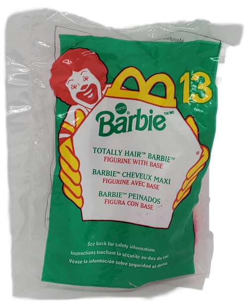 McDonald's Happy Meal toy of Totally Hair Barbie from the 1999/2000 "Once in a Lifetime" Barbie/Hot Wheels series. The Barbie is wearing pink dress with flowers on it. The series contains 10 different Barbies and 10 different Hot Wheel cars and was available December 31. 1999 - January 27, 2000.