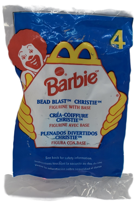 McDonald's Happy Meal Toy of Bead Blast Christie from the 1998 Barbie/Hot Wheels series. Christie stands 4.5-inches tall and is wearing a pink and white striped outfit. The series contains 4 different Barbie themed toys and 4 different Hot Wheels vehicles and was available August 14 - September 16, 1998.