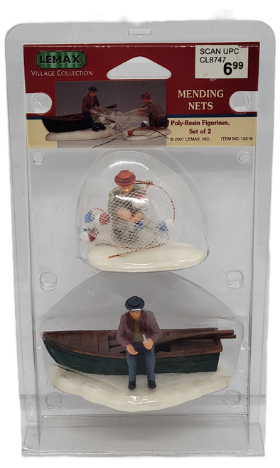 Lemax 2001 Mending Nets set of 2 from the Village Collection. The set #12518 features 2 different figures with one figure mending a fishing net and another figure sitting on the side of a row boat with a knife. The set also includes two different poly-resin figurines.
