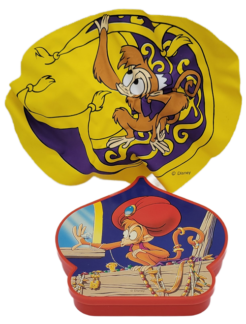 Burger King Kids' Club toy of inflatable Abu from the 1994 Disney's Aladdin hidden treasure box series.  The set consists of 5 different hidden treasure boxes based on the Aladdin series and was available April - May 30, 1994.