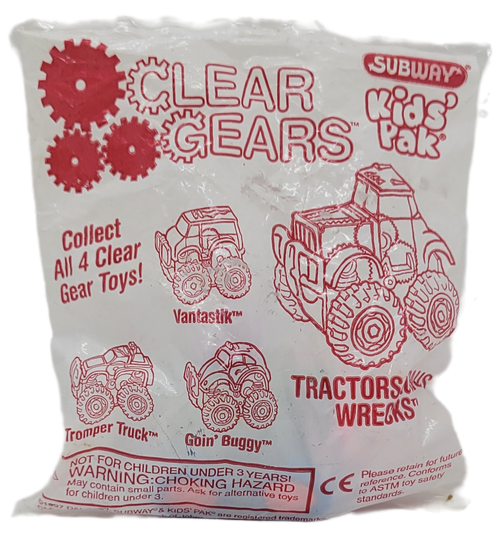 Subway Kids' Pak toy Tractorsauraus Wrecks from the 1997 Clear Gears series of toys. Tractorsaurus Wrecks is a clear tractor with blue wheels, purple roof and pink front. The series contains 4 different clear toys and was available in 1997.