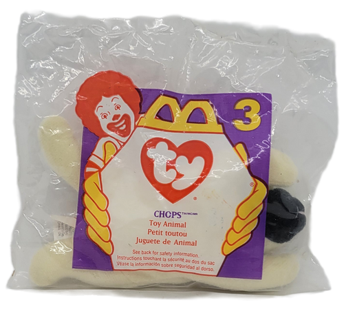 McDonald's Happy Meal Toy of Chops the lamb from the 1997 Ty Teenie Beanie Babies series of toy animals. Chops is white with black face. The series contains 10 different Ty Teenie Beanie Babies and was available April 4 - 24, 1997.