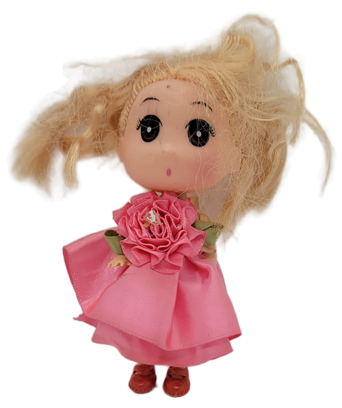 Hard plastic 4.5-inch tall blonde hair doll wearing a pink dress with pink rose on chest. The doll was a keychain.
