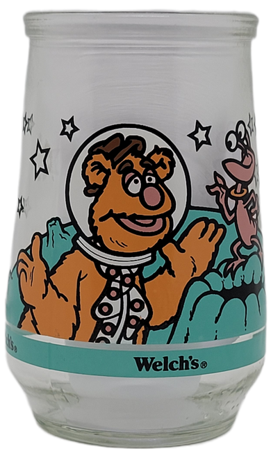 Welch's Jelly jar 1998 Muppets in Space glass of Fozzie Bear Gets a Giggle. The series contains 6 different jelly jars featuring the characters from Muppets in Space. The jars were designed to be used as juice glasses after jelly is removed.