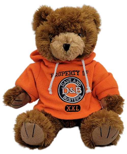Dave & Buster's 14-inch teddy bear wearing an orange hoodie with "Property of Dave and Buster's XXL" The plush bear is soft with felt paw pads and black felt eyes.