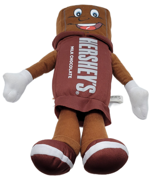 Hershey's 2014 Hershey's Milk Chocolate bar 14-inch plush made by Toy Factory. The plush features a Hershey's Milk Chocolate Bar with arms, legs and a face and was a souvenir available at Hershey Park and Chocolate World. The advertising souvenir was made in China and made of Polyester Fibers.