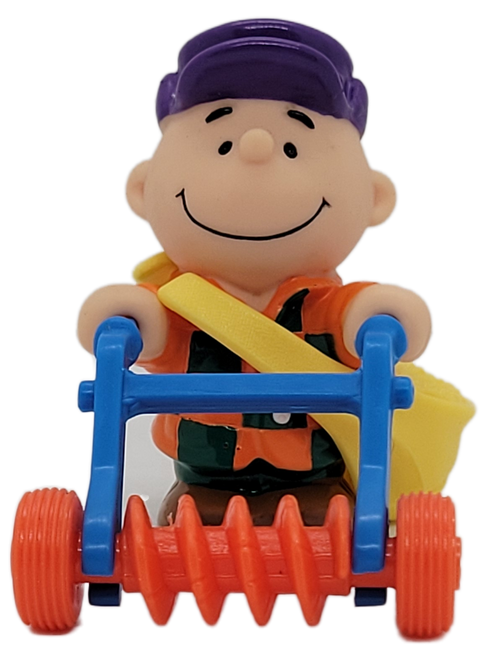 McDonald's Happy Meal Toy of Charlie Brown's Seed Bag N' Tiller from the 1990 Peanuts series of toys. Charlie Brown is wearing his orange and green checkered shirt with purple hat with yellow bag of seeds at his side while pushing a blue handled tiller. The series contains 4 different farming themed Peanuts characters and was available March 30-April 26, 1990.