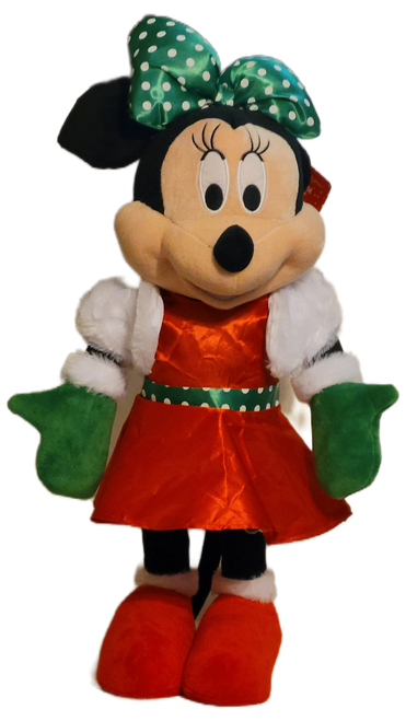Gemmy 2018 Disney's Minnie Mouse Holiday Greeter that stands 22-inches tall. Minnie is wearing green gloves, red dress with white fur trim, green belt and bow with white polka dot. The plush greeter is in a standing pose and ready to be added to your Christmas decor.