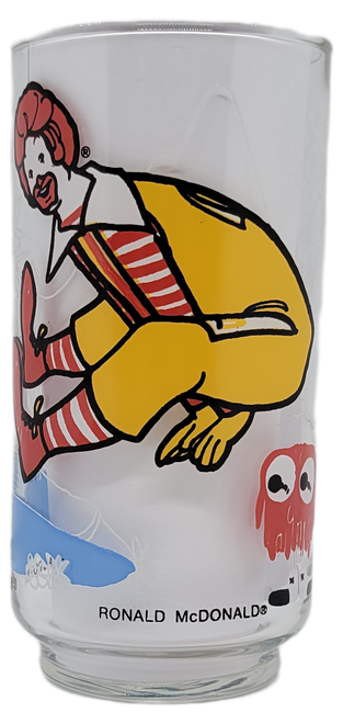 Vintage 1977 collector series character glass of Ronald McDonald from McDonaldland. These glasses were available at McDonalds fast food restaurants when you purchased a medium drink and featured Ronald McDonald leapfrogging a red Fry Guy into Filet of Fish Lake.
