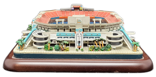 Pro Player Stadium, now known as Hard Rock Stadium is the home of the Miami Dolphins. The detailed replica stadium was done by The Danbury Mint. The Pro Player Era (1996–2005): In 1996, apparel brand Pro Player acquired the naming rights. During this period, the stadium hosted iconic sporting events, including Super Bowl XXXIII (1999) and Super Bowl XLI (2007). It was also the home field where the Florida Marlins secured their first World Series Championship in 1997. The base measures 6-inches long by 5.5-inches wide and the height of the stadium is 2-inches tall.