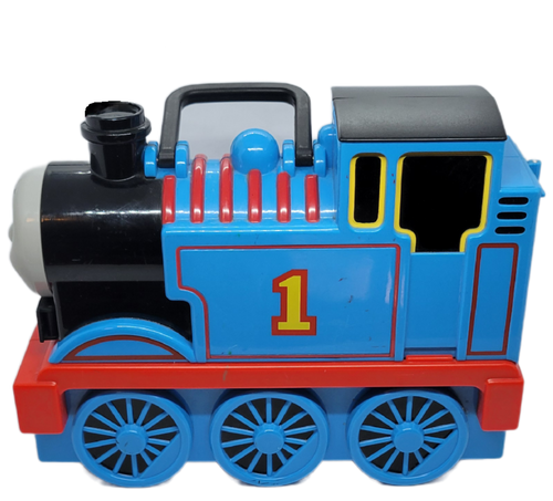 Thomas & Friends Take Along Travel Tote featuring Thomas the Tank Engine shaped carrying case that holds 17 vehicles. The plastic case of Thomas has his blue color with red and yellow trim with his number 1 on the side. The front of the engine has Thomas's face to complete the Thomas replica. "Thomas & Friends" features Thomas the Tank Engine going on adventures with his fellow locomotives on the island of Sodor. Thomas Travel Tote is 12-inches long by 9-inches tall and is 4.25-inches wide and for ages 3 & up.