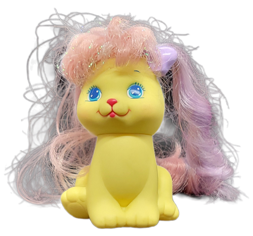 Sweetlee is an adult yellow dog whose hair would "grow" if pulled from either the tail or the large plastic bows on the head. When the hair from the tail was pulled it would get longer and the hair from the bows would shorten and vise versa. Sweetlee could be purchased by herself or in a set with the Bonus Pet Zizi.