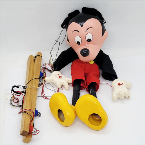 Vintage Pelham Puppets Walt Disney's Mickey Mouse hand made standard puppet for children. The Mickey Mouse marionette has a molded composition head with wooden limbs and a cross-shaped wooden control bar with strings. Pelham Puppets were Made in England.