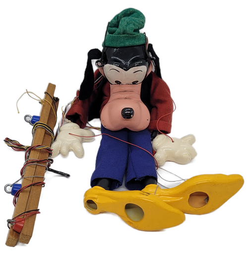 Vintage Pelham Puppets Walt Disney's Mickey Goofy hand made standard puppet for children. The Goofy marionette has a molded composition head with wooden limbs and a cross-shaped wooden control bar with strings. Pelham Puppets were Made in England.
