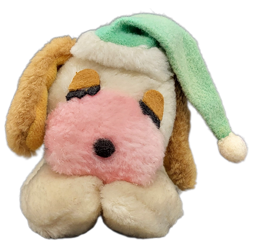 Vintage 1980 Wallace Berrie & Co small bean bag plush of Cream Puff a sleeping puppy. Cream Puff is 5-inches long with pink snout and wearing a green Santa hat. The bean bag plush was Made in Korea.