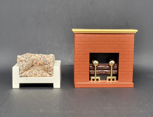 Fisher-Price doll house decorator set #254 Chair and Fireplace.  The chair and fireplace set includes a plastic fireplace and FPT5022 white plastic square chair with tan stuffed fabric cushion that fits the chair with muli-colored flowers.