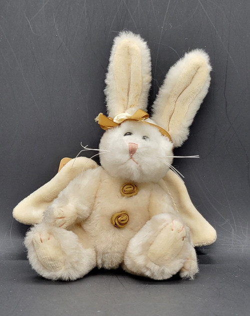 Moondust Goodspeed bunny rabbit hare ornament #5624-08 by Boyds Bears. The plush ornament is posable and was introduced in 1999 and now retired. Moondust Goodspeed is 5 1/2-inches tall and is wearing gold ribbon on head and gold buttons on chest.