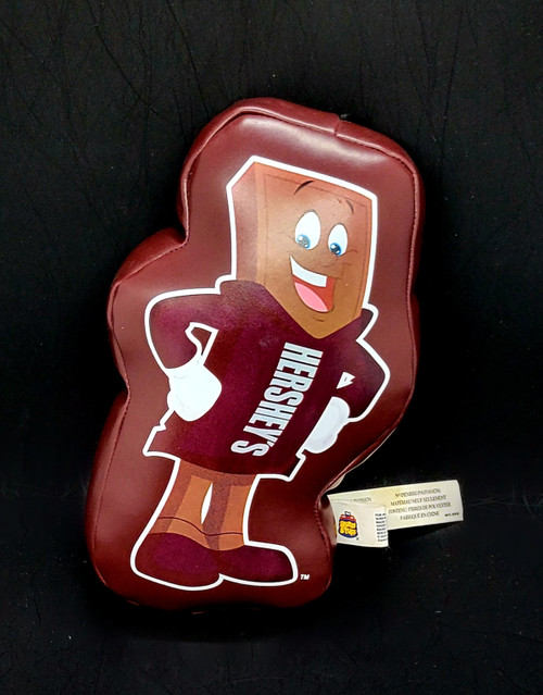 Hersheypark exclusive 8-inch vinyl plush of the Hershey's Milk Chocolate Bar mascot. The plush has the Hershey's Chocolate Bar mascot on front and Hersheypark on the back. The plush was made by Good Stuff and was Made in China for all ages.