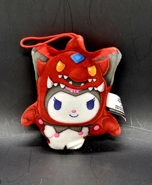 2024 McDonald's Happy Meal Toy: Kuromi x Slifer the Sky Dragon – Yu-Gi-Oh! x Hello Kitty & Friends, red and gray plush Kuromi wearing a Slifer the Sky Dragon costume with yellow eyes, fangs, and a red hanging loop, shown against a black background.