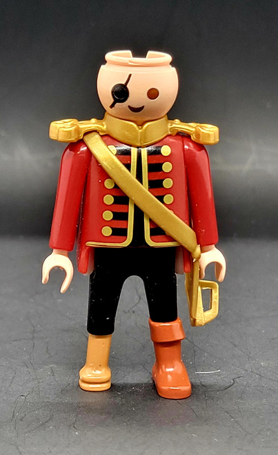 Geobra the German manufacture of Playmobil 2002 Pirate Captain (part #30008830) from 3174 Red Pirateship Set 3-inch tall figure for ages 4+. The figure is wearing a red coat with gold buttons and black pants. The figure is missing his hat (part #30626230), feather (part #30043340), cuffs (part #30209490) and his beard and hair.