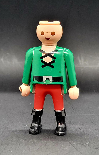 Playmobil GEOBRA PLAYMOBIL 2002 3174 Red Pirateship Pirate 3-inch Figure (Part #30007040), vintage pirate toy figure wearing a green lace-up shirt, red trousers, and black boots, shown standing against a dark background.