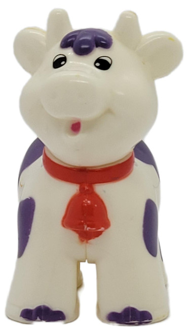 Kidoozie Funtime Tractor Cow Replacement Figure, white cow toy with purple spots and forelock, a red collar and bell, and a friendly face, shown against a white background.