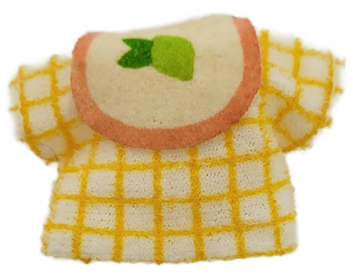 American Greetings 1979 Strawberry Shortcake Ada Shirt, close-up of a vintage cream fabric shirt with a yellow checkered pattern and a rounded neckline featuring a green leaf design.
