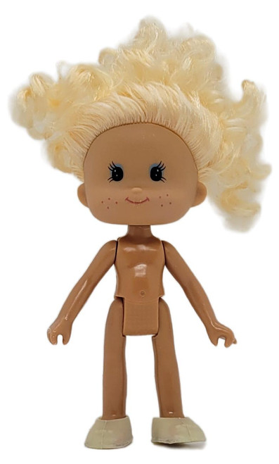 Greenbrier International Vintage Greenbrier International Doll Figure with Blonde Hair - 5" Retro Toy for Collectors & Kids, front view of a small articulated doll with curly blonde hair, a smiling freckled face, brown body, and light-colored shoes on a white background.
