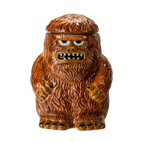 Pacific Trading Bigfoot Ceramic Cookie Jar, brown furry Bigfoot-shaped ceramic cookie jar with a removable lid, expressive face, and detailed feet displayed against a white background.