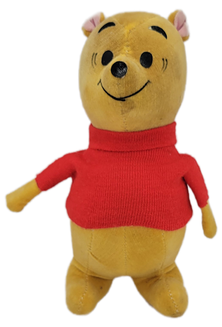 1960'S sawdust stuffed Pooh from the Disney story Winnie the Pooh.  This line was made in Japan and is referred to as the line sold in Sears stores during that time. It features a yellow velveteen exterior, pink-lined inner ears, and a stiff or sawdust/wood-chip stuffed body with a classic red knit turtleneck sweater. This Winnie the Pooh has some spots of dirt and discoloration but would be a very nice piece to any Disney or Pooh collection.