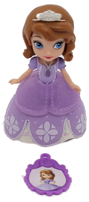 Mattel 2012 Disney Sofia the First Princess Sofia 3-Inch Figure #1 (Loose), Princess Sofia figure wearing a purple gown and silver tiara, shown with a matching purple accessory against a white background.