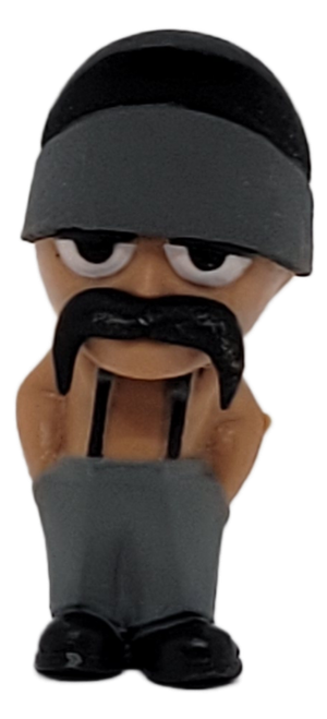 Homieshop 2014 Big Loco 1.75-inch tall figure from the Homies Big Headz series 1. Big Loco has large head, thick black mustache, grey cap/bandana, and overalls with suspender. He is a youth gang counselor and arbitrator.