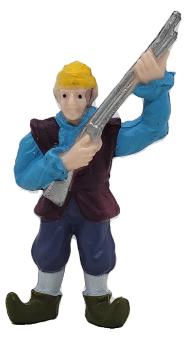 Add this vintage colonial-era rifleman figure to your toy soldier or historical figure collection. This small molded plastic figure measures approximately 2½ inches tall and features a colonial/frontiersman-style character holding a long rifle or musket.

The figure is dressed in a blue shirt, burgundy vest, blue trousers, white socks, and green curled boots, giving it a distinctive and colorful appearance. The back of the figure is molded with “CHINA.”